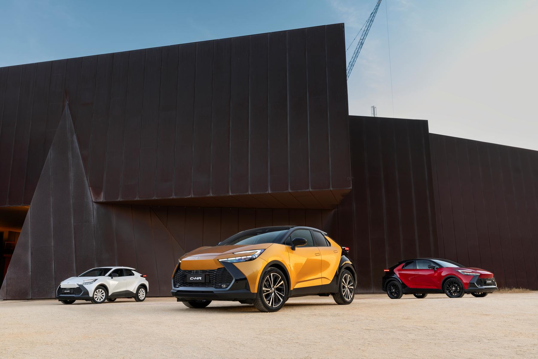 2024 Toyota C-HR range.  GXL (L), Koba (centre) and GR Sport (R).