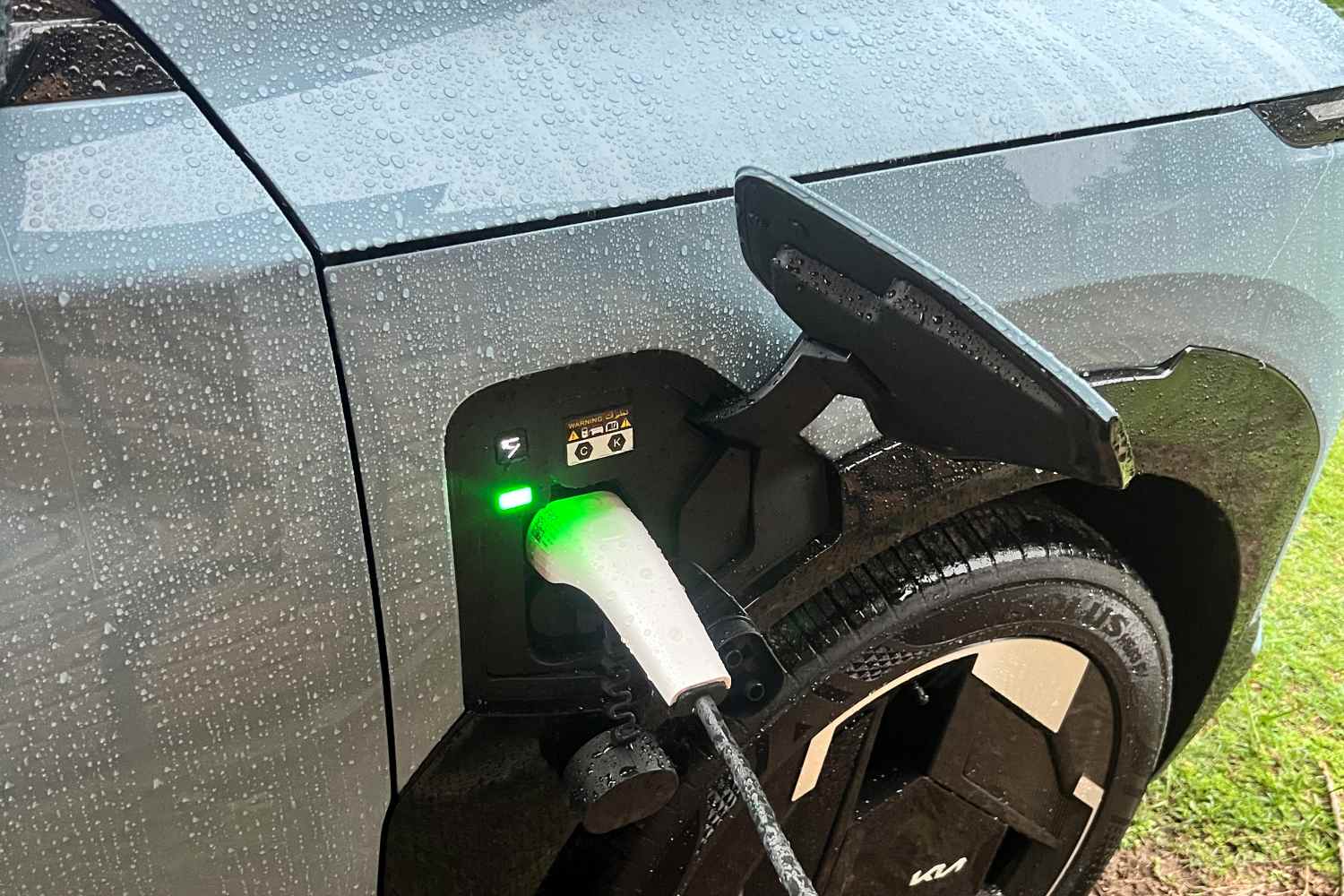 Kia EV5 GT-Line charging in the rain 1