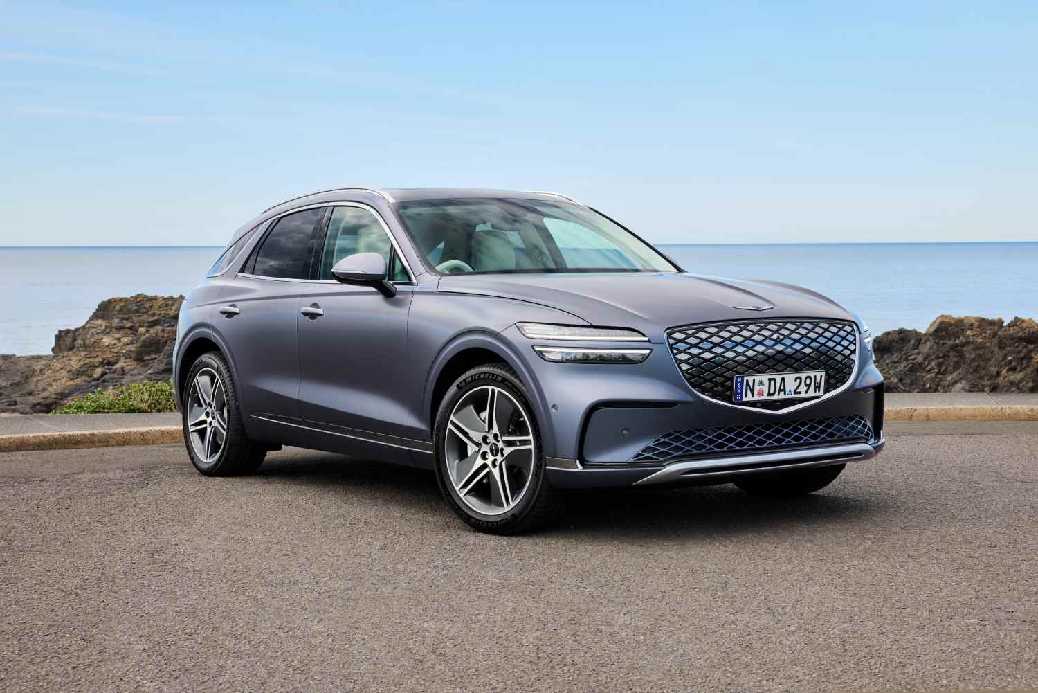 2025 Electrified GV70 front quarter and grill 1