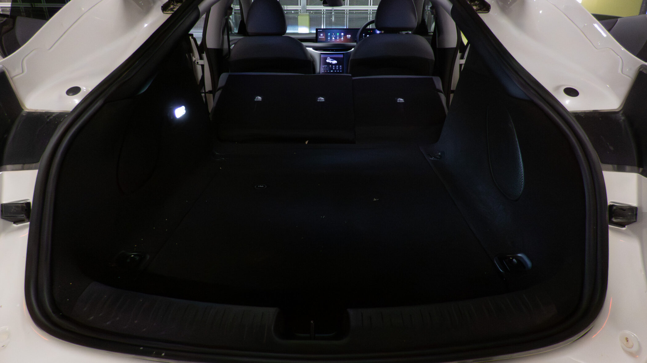 Rear cargo area with the boot open and rear seats fully folded down