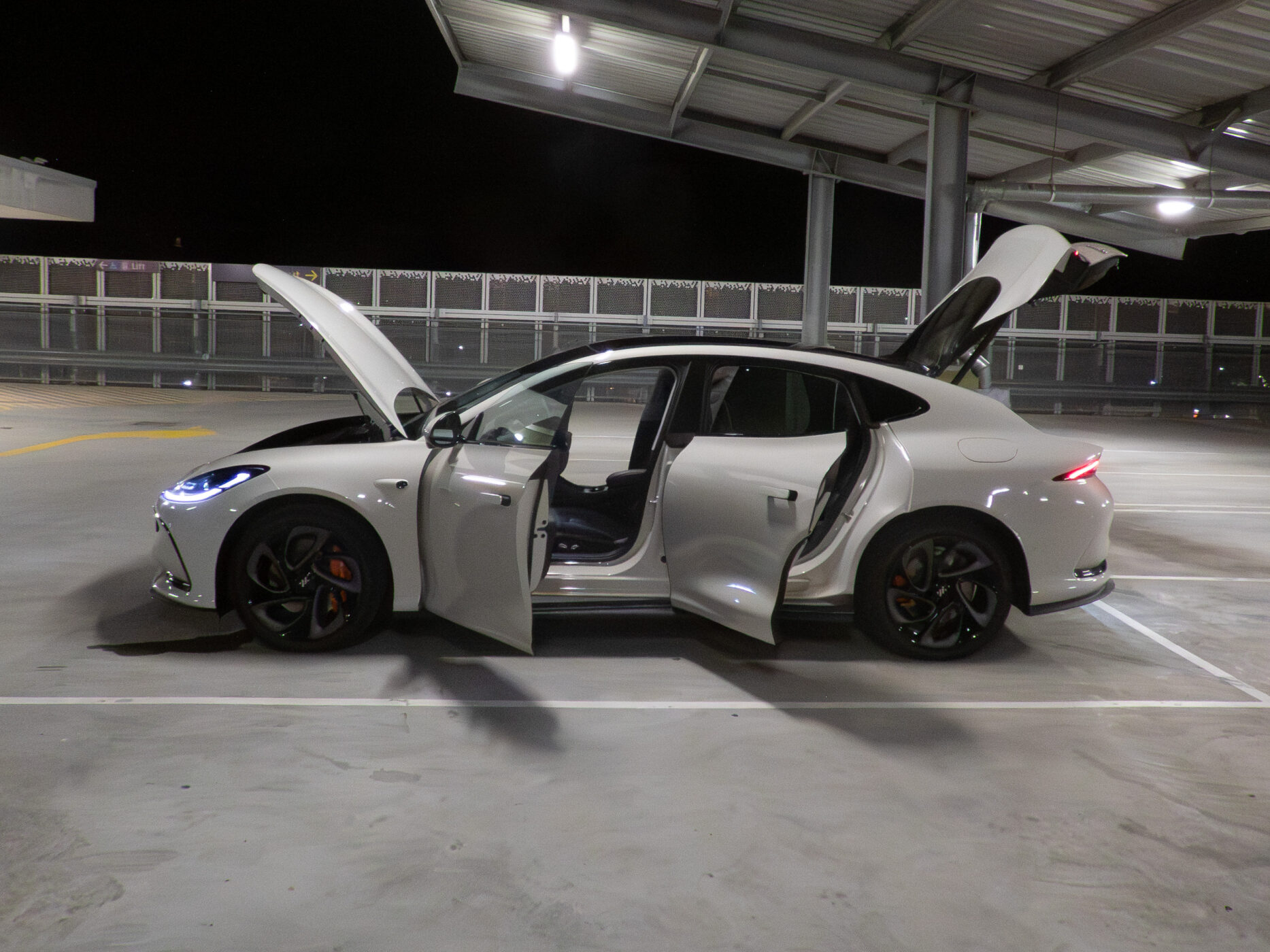 Full profile of the IM5 Performance 2025 with all doors and boot lid open