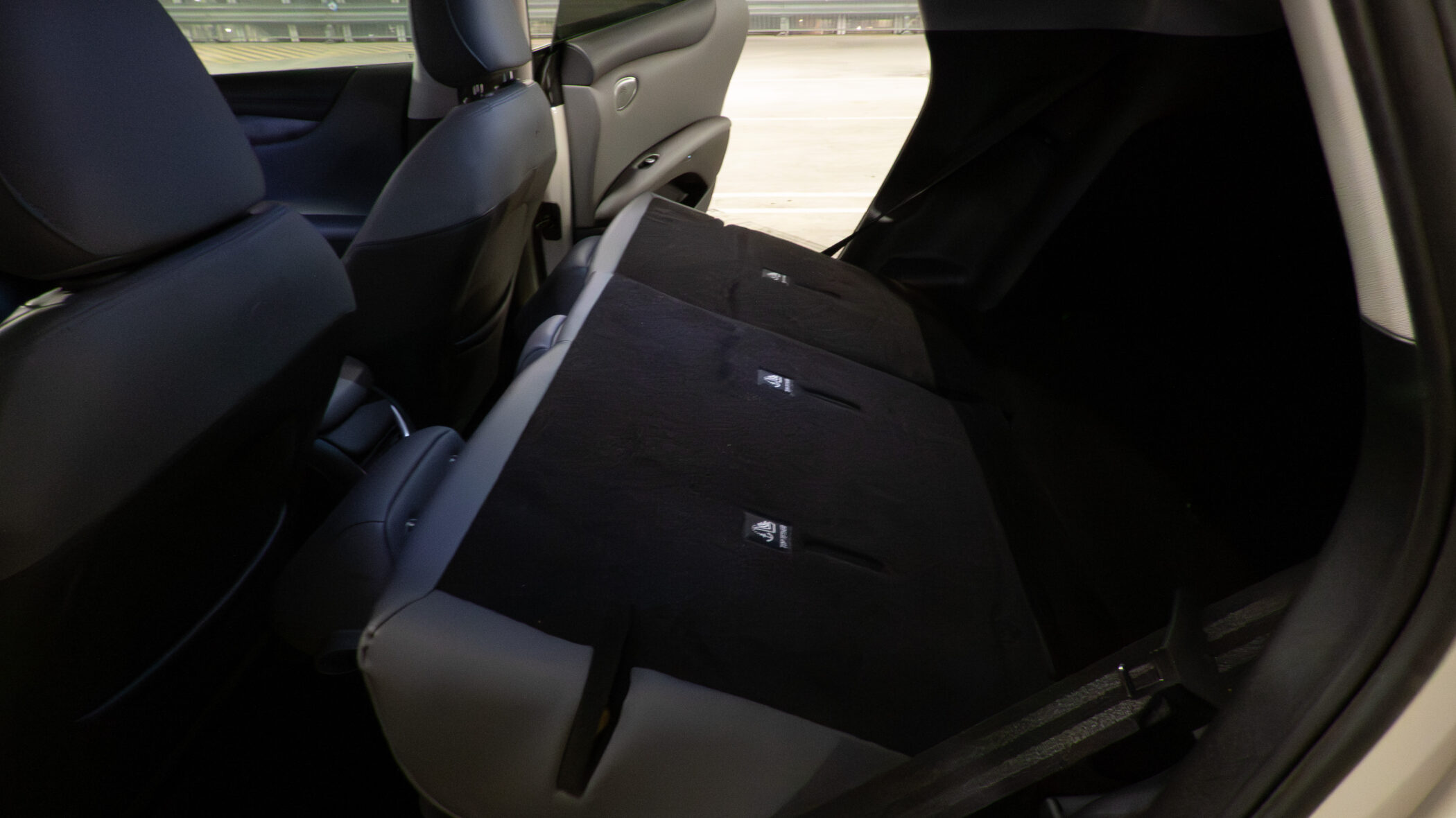 Full view of the cargo area with all rear seats folded flat in the IM5 Performance 2025