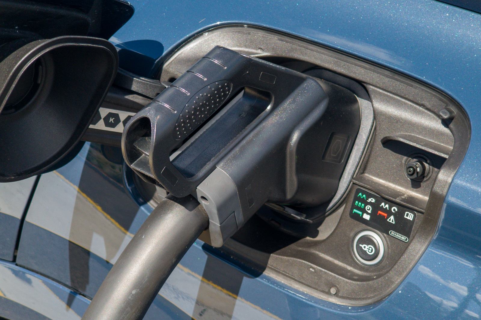 DC fast charger plug inserted into the Audi Q6 e-tron, supporting up to 270kW charging.