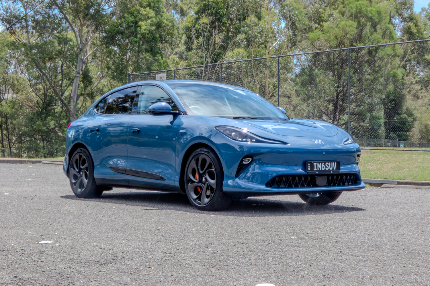 Front-driver side angle of the 2025 IM6 Performance SUV in the flagship launch color.