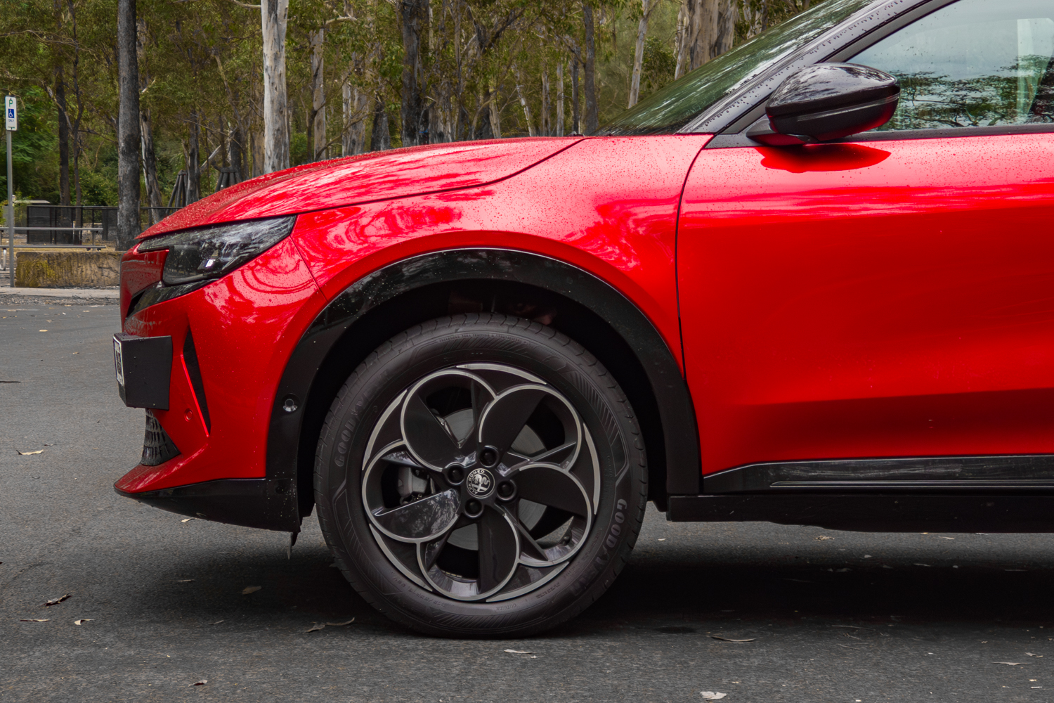 Front wheel arch and sculpted bonnet line on the Junior Ibrida in Alfa Red