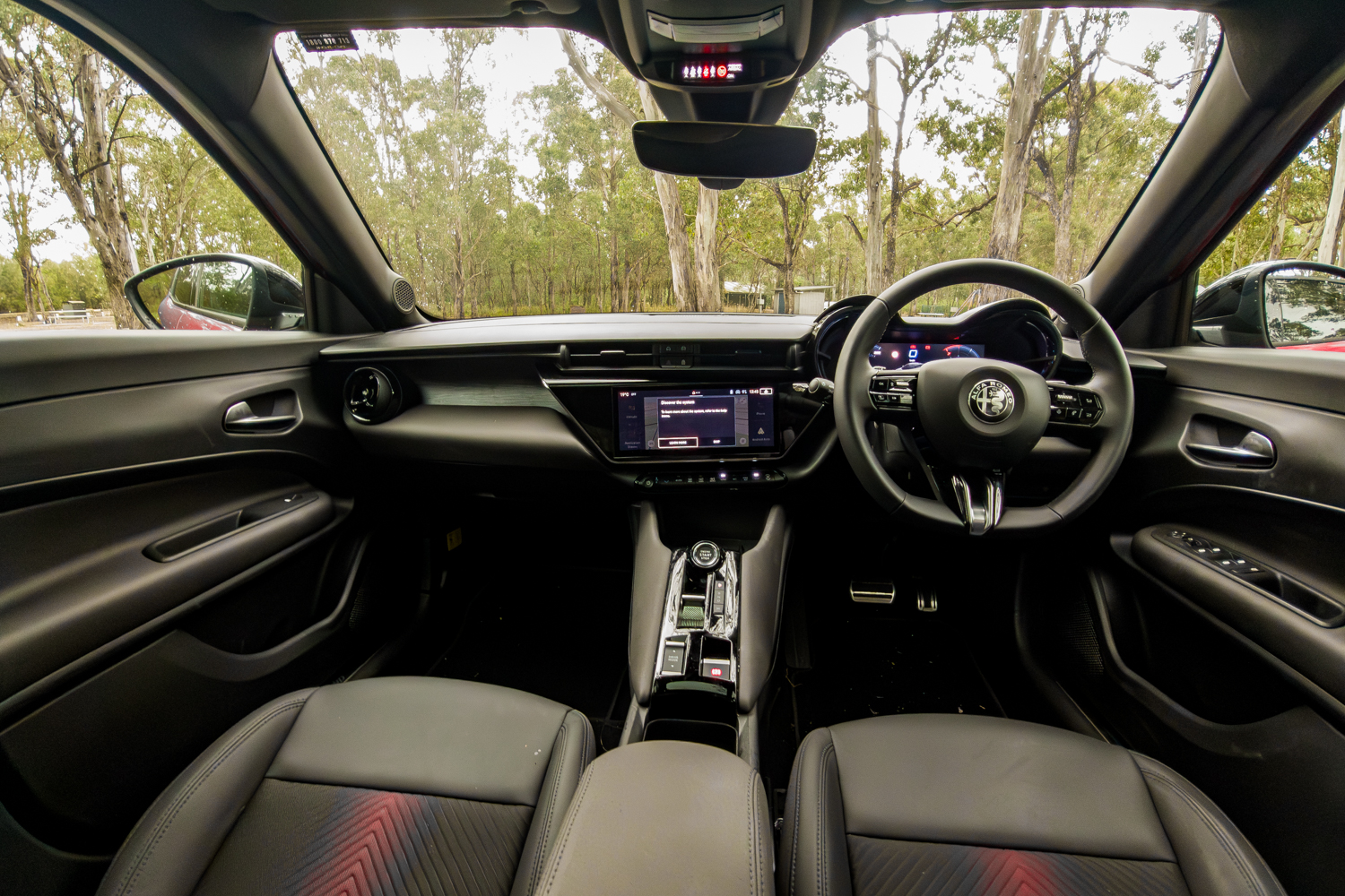 2026 Alfa Romeo Junior Ibrida interior from driver perspective