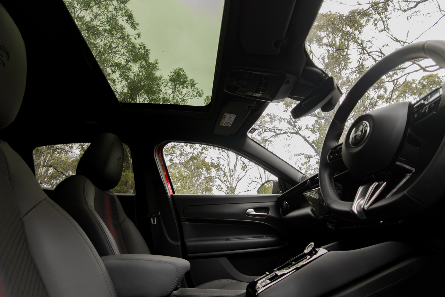 Panoramic glass roof interior shot from the rear seat