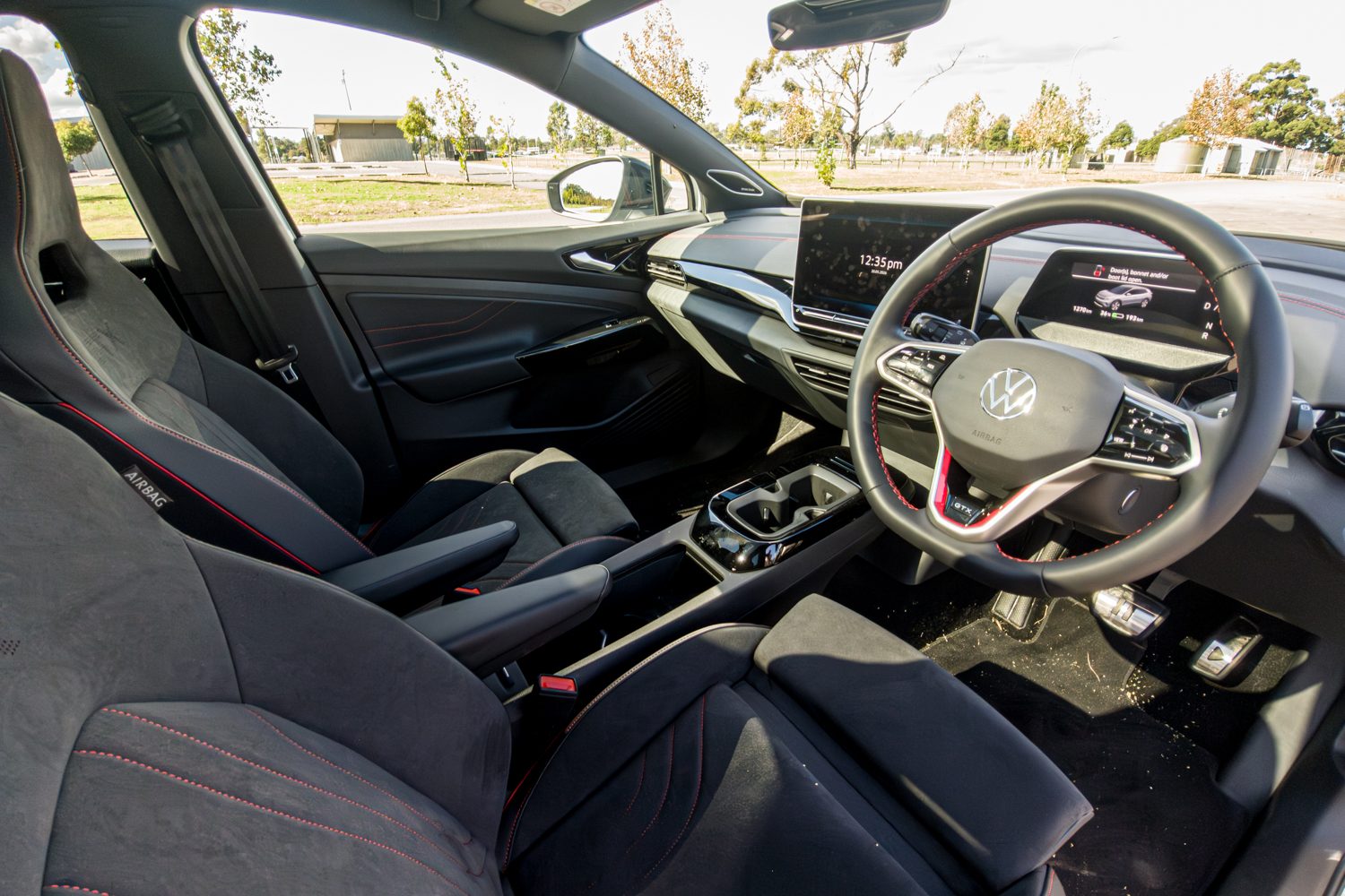 Front sport seats with red stitching in the 2026 Volkswagen ID.4 GTX