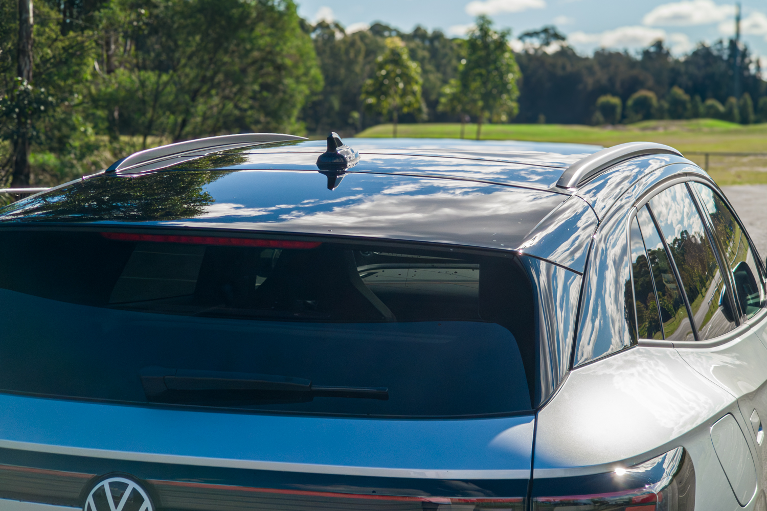 Roofline, rear spoiler and glass roof of the silver 2026 Volkswagen ID.4 GTX