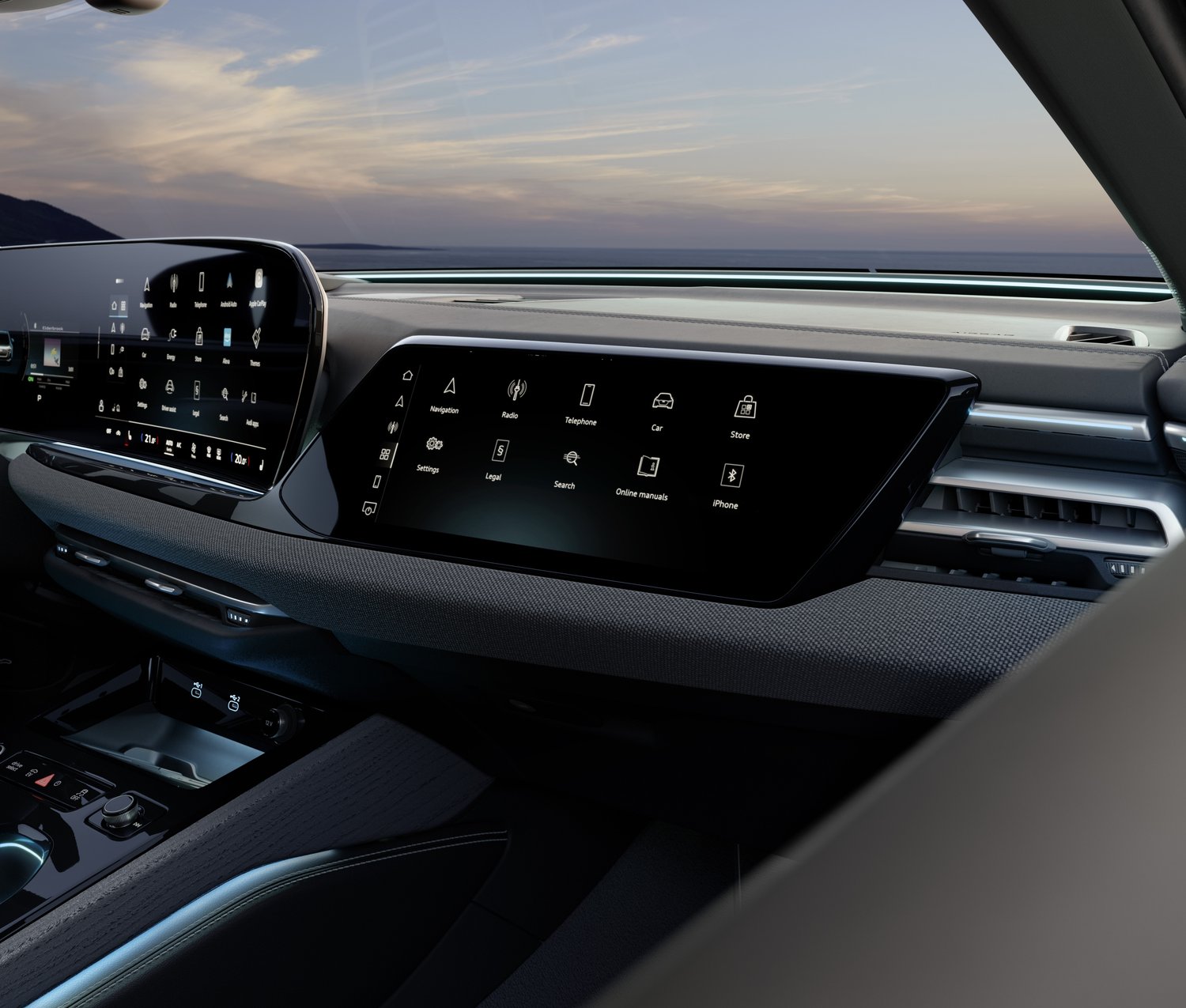 Close-up of the 2026 Audi A5 e-hybrid quattro MMI touchscreen and front passenger display