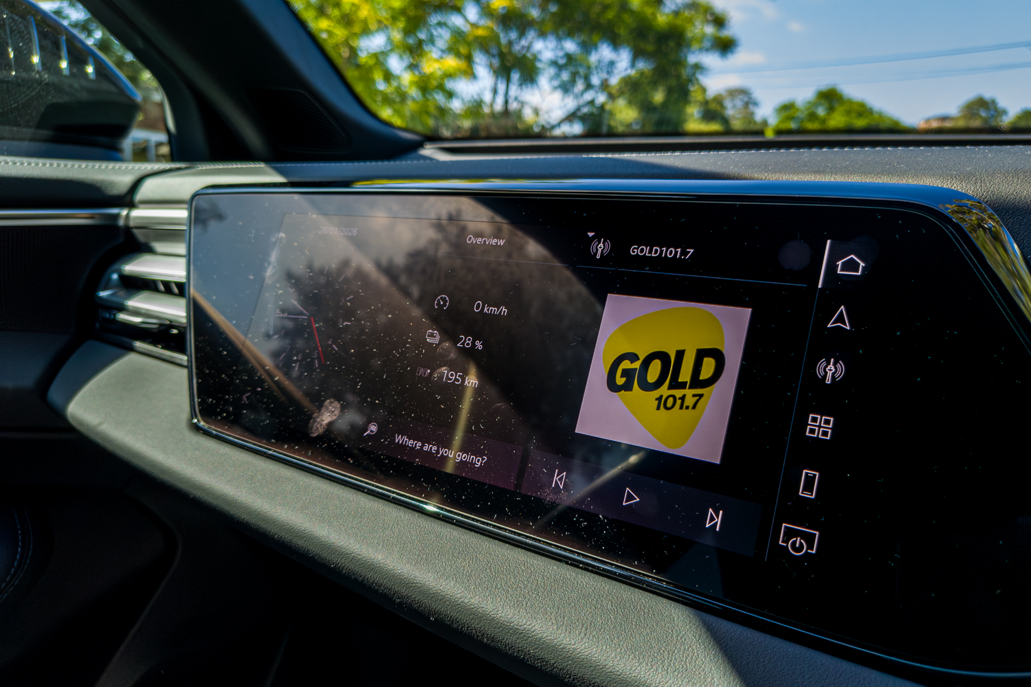 MMI infotainment screen of the 2026 Audi A5 Sedan e-hybrid quattro showing EV range and radio