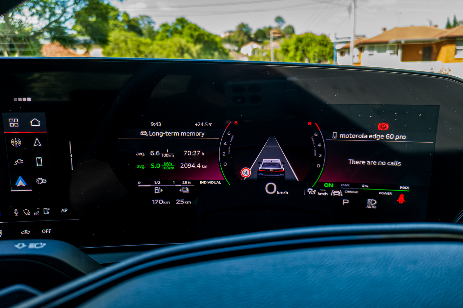 Audi Virtual Cockpit in the 2026 Audi A5 Sedan e-hybrid quattro showing hybrid consumption data