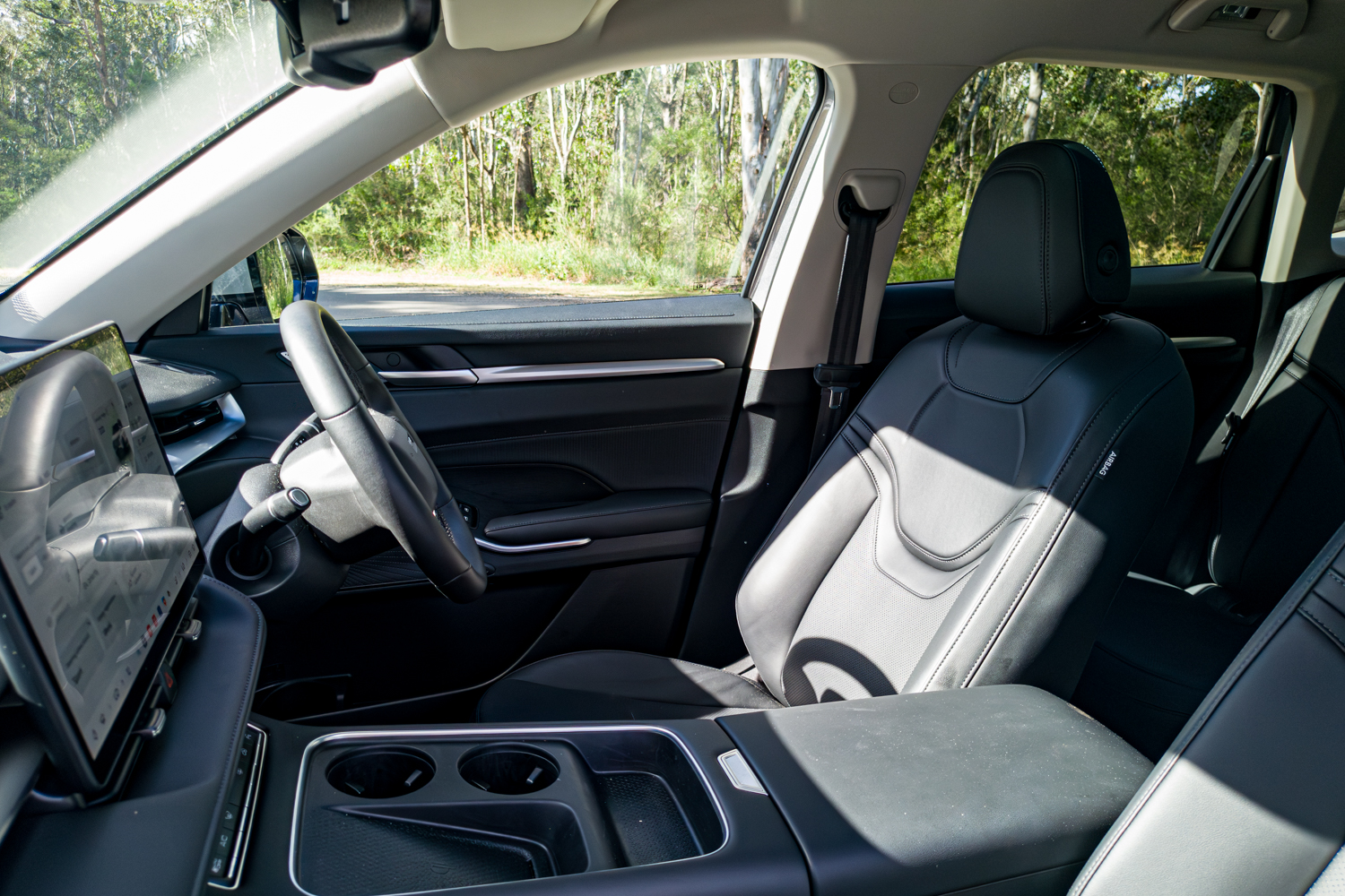 Front seats and cabin of the 2026 GWM Haval H6 PHEV with two tone upholstery