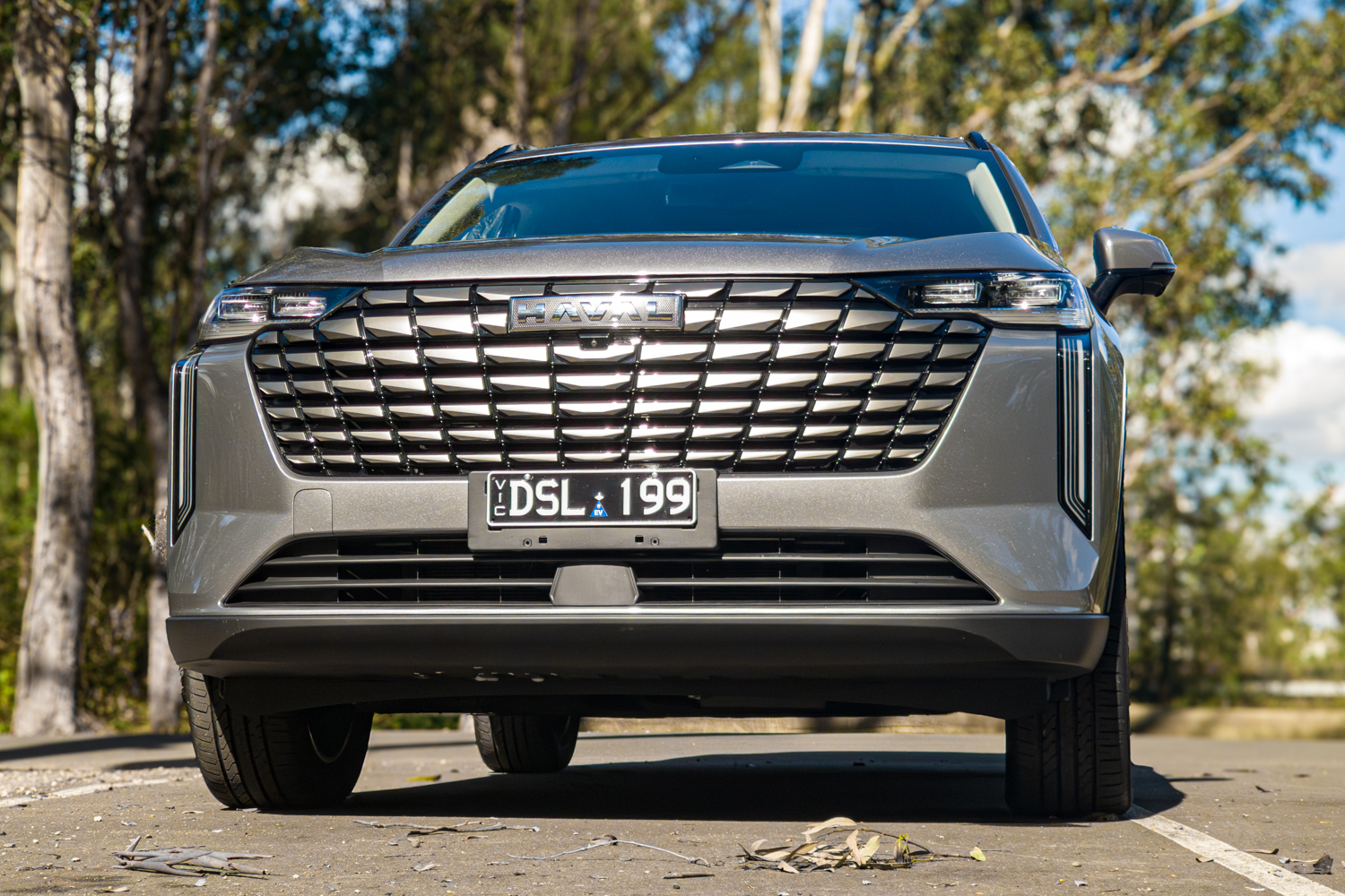 Low straight on front view of the grey 2026 GWM Haval H6 PHEV
