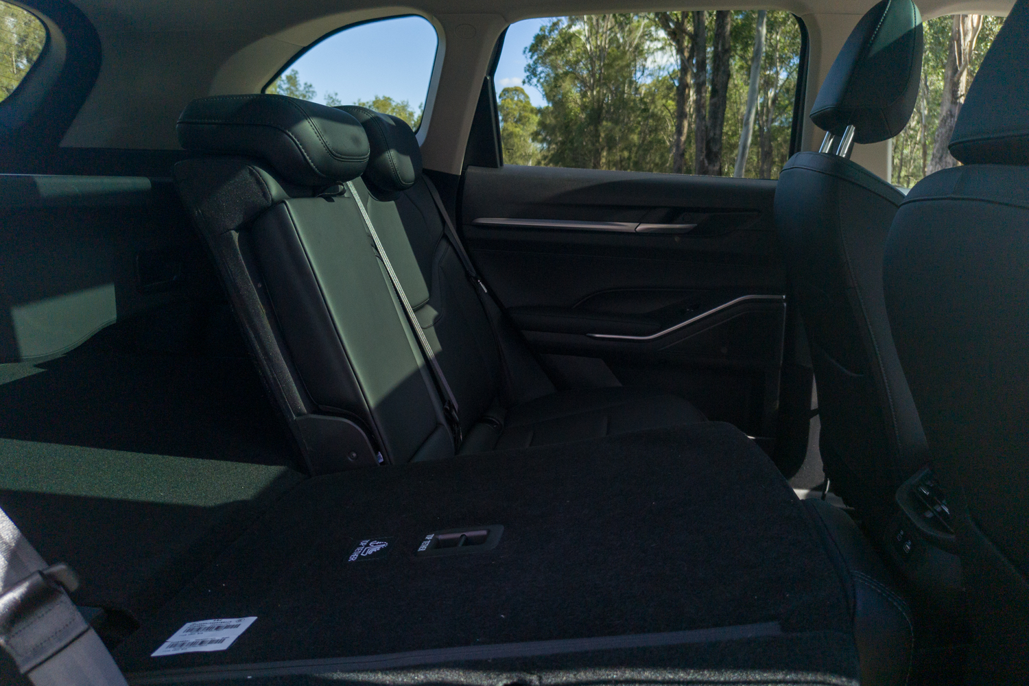 Rear seats of the 2026 GWM Haval H6 PHEV with one section folded flat