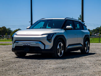 Passenger's-side front three-quarter view of the silver 2026 Kia EV3 Earth Long Range
