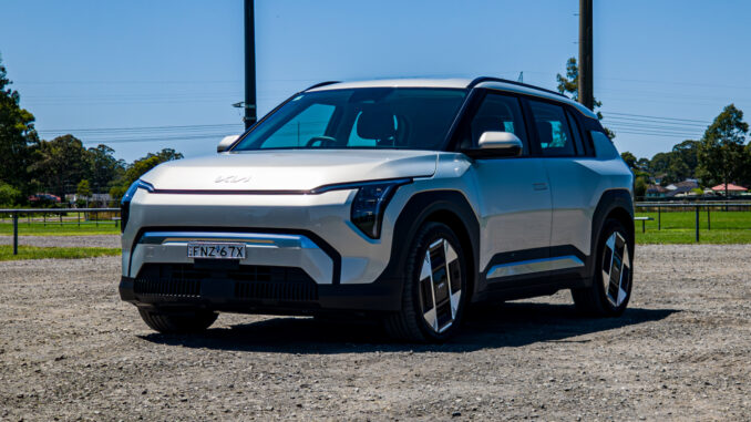 Passenger's-side front three-quarter view of the silver 2026 Kia EV3 Earth Long Range