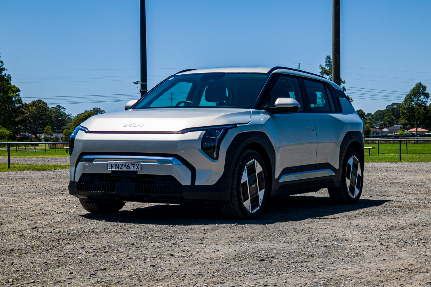 Passenger's-side front three-quarter view of the silver 2026 Kia EV3 Earth Long Range