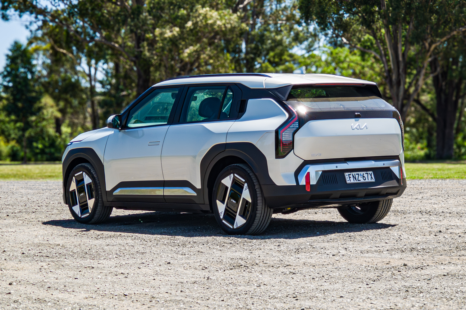 Passenger's-side rear three-quarter view of the silver 2026 Kia EV3 Earth Long Range
