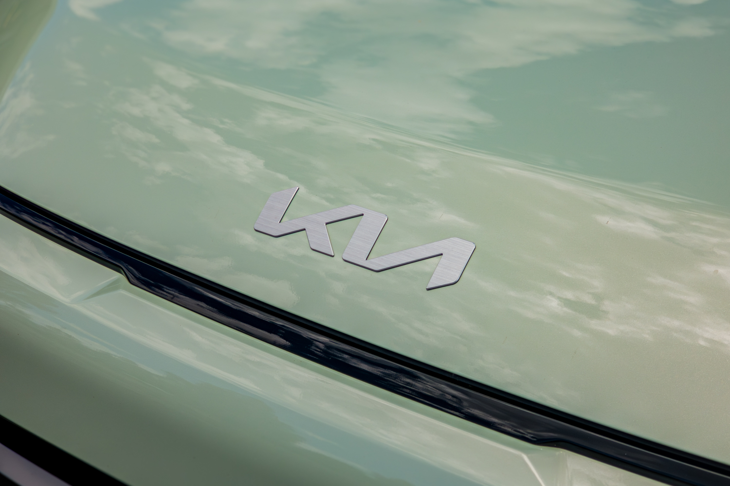 Brushed silver Kia badge on the bonnet of the 2026 Kia EV3 GT-Line