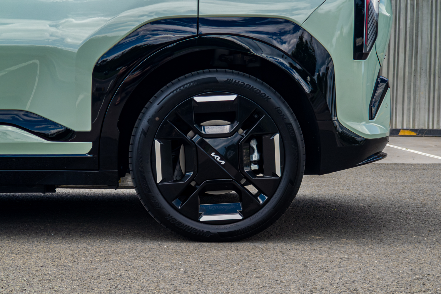 Front alloy wheel close-up of the 2026 Kia EV3 GT-Line with Kia centre cap