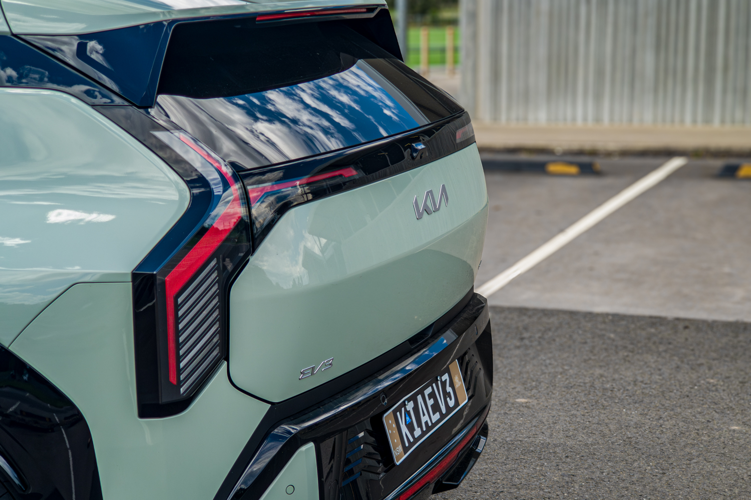 Close-up of the 2026 Kia EV3 GT-Line rear tail light with louvres and Kia badge