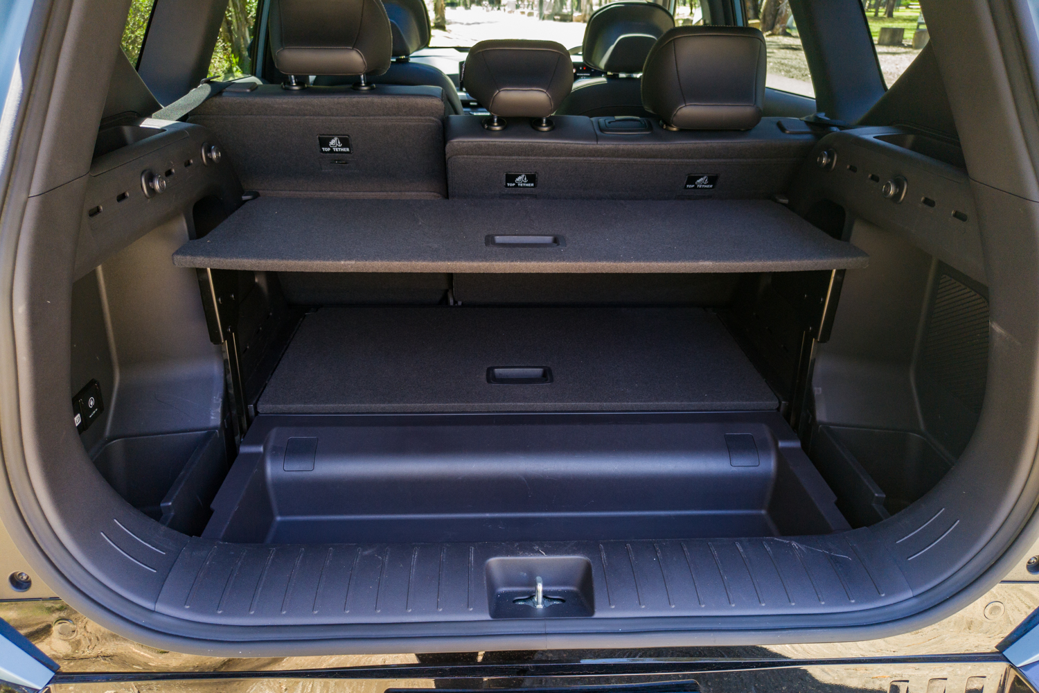 Kia EV5 GT-Line open boot showing the parcel shelf and dual-level load floor