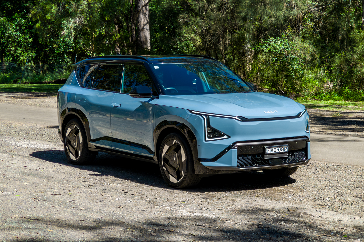 Front three-quarter view of the blue Kia EV5 GT-Line electric SUV from the driver's side