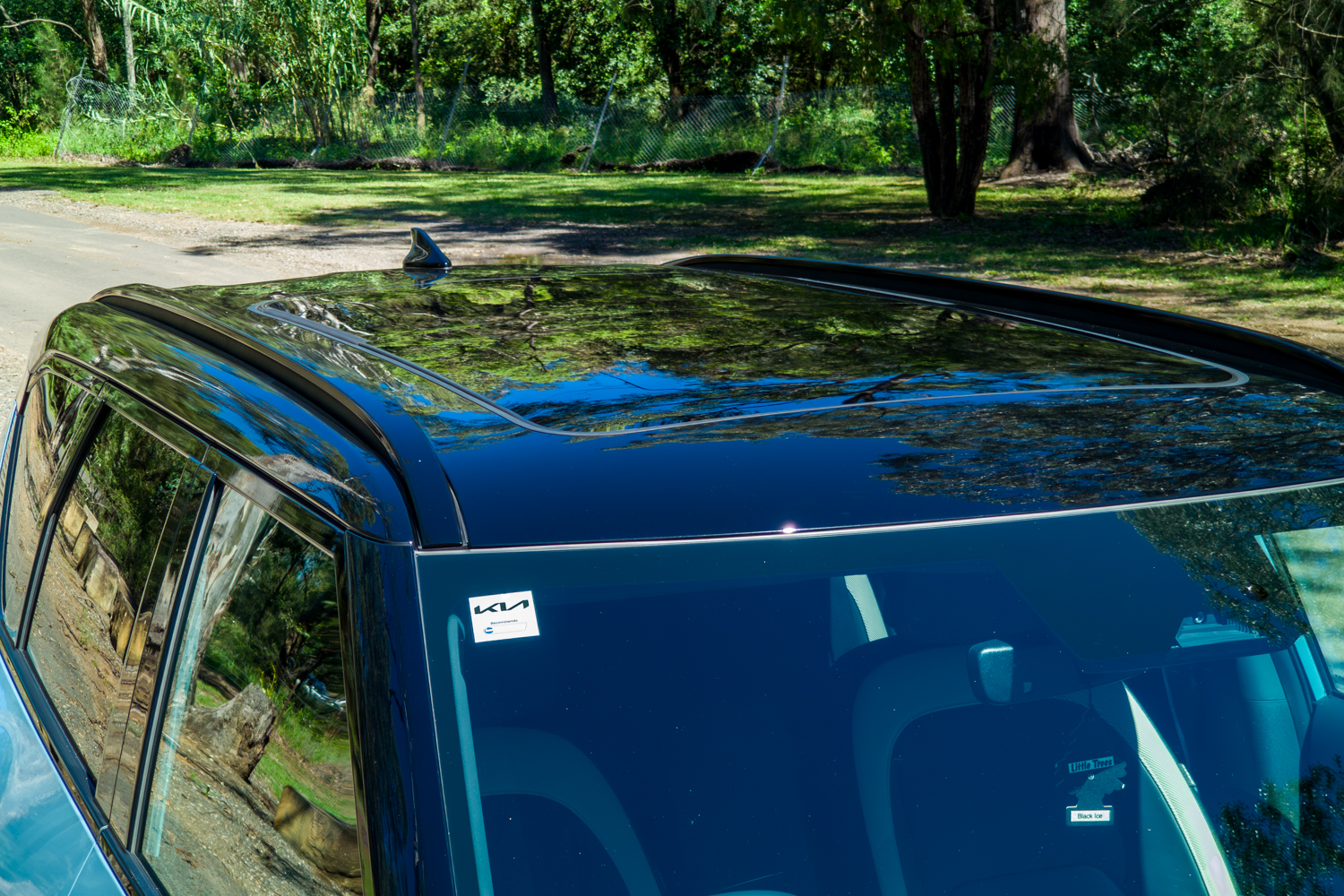 Exterior view of the Kia EV5 GT-Line panoramic glass roof and shark-fin antenna