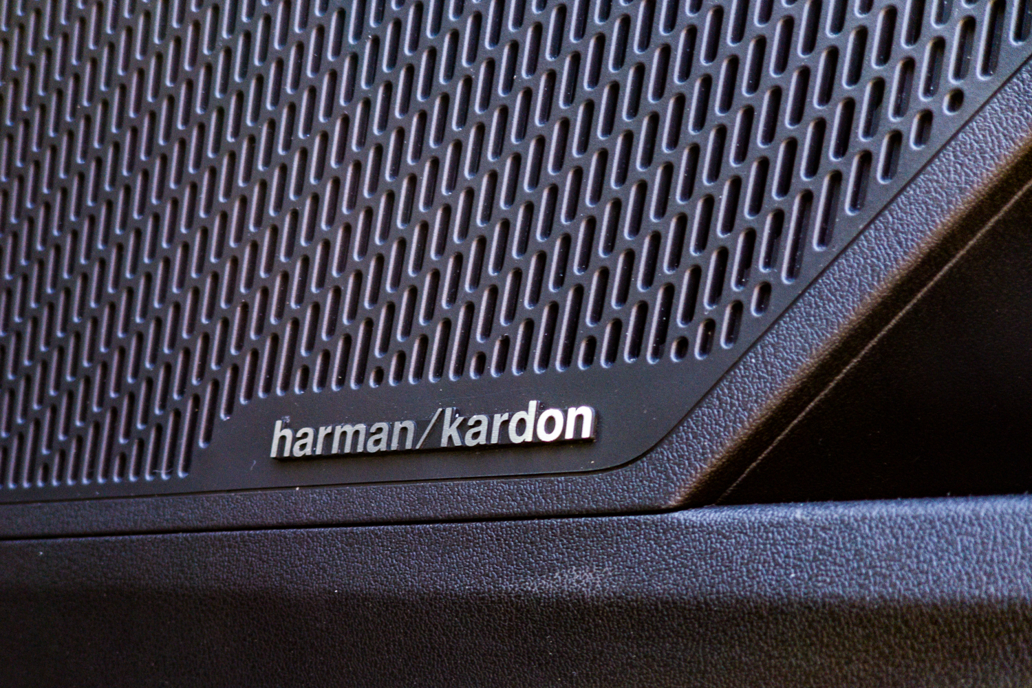 Harman/Kardon speaker grille badge in the Kia EV5 GT-Line