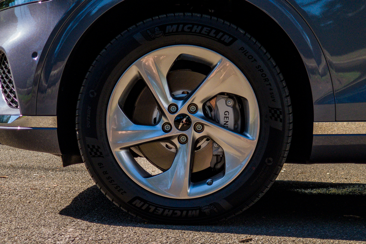 Close-up of the 2026 Genesis GV70 2.5T Advanced 19-inch alloy wheel with Michelin Pilot Sport 4 SUV tyre and Genesis caliper