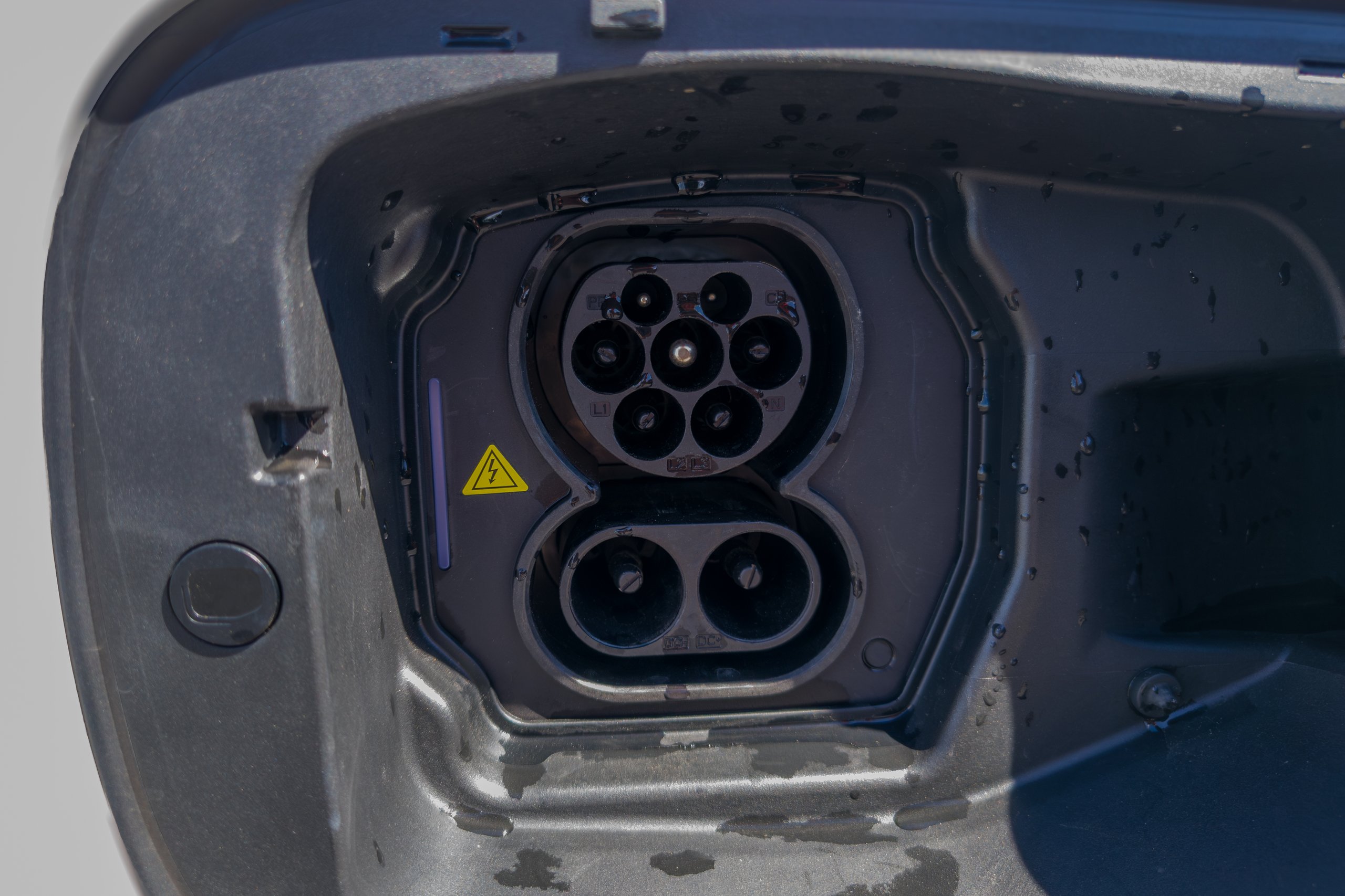 Close-up of the CCS2 combined AC and DC charging socket on the 2026 Jaecoo J5 EV Summit