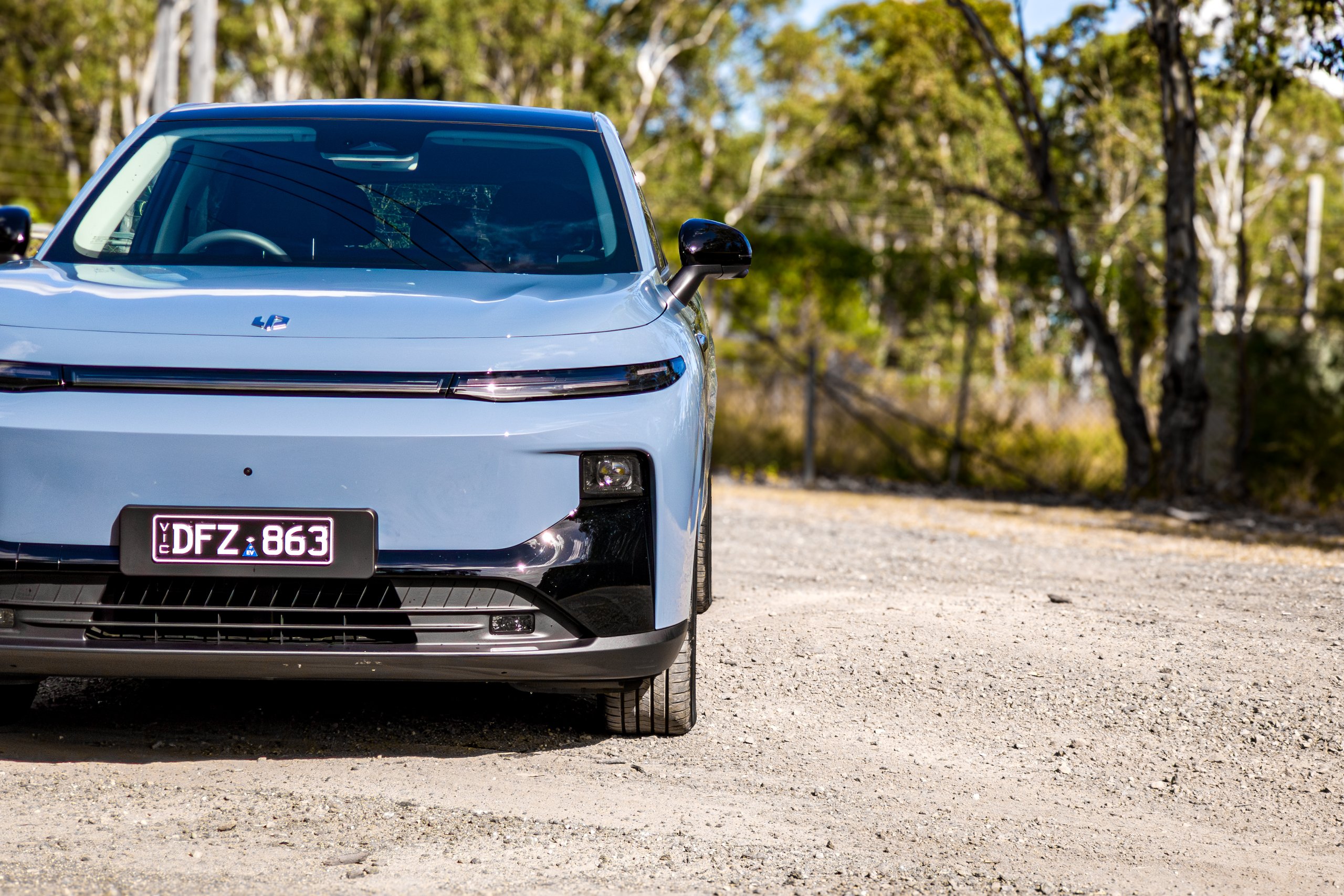 Low straight-on front of the 2026 Leapmotor B10 showing full-width LED headlight strip and black bumper