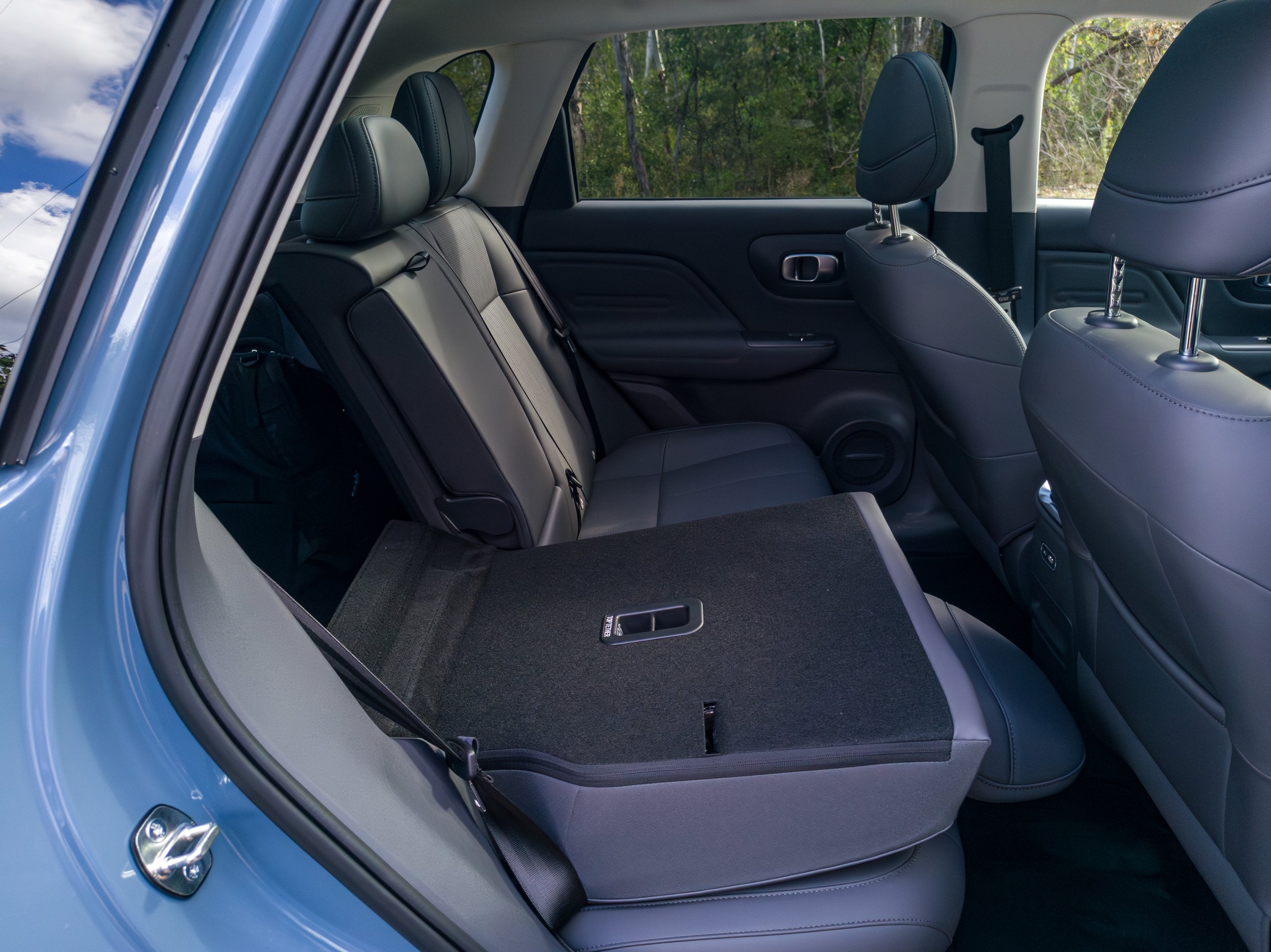 2026 Leapmotor B10 rear seat with one section folded forward showing expanded cargo flexibility