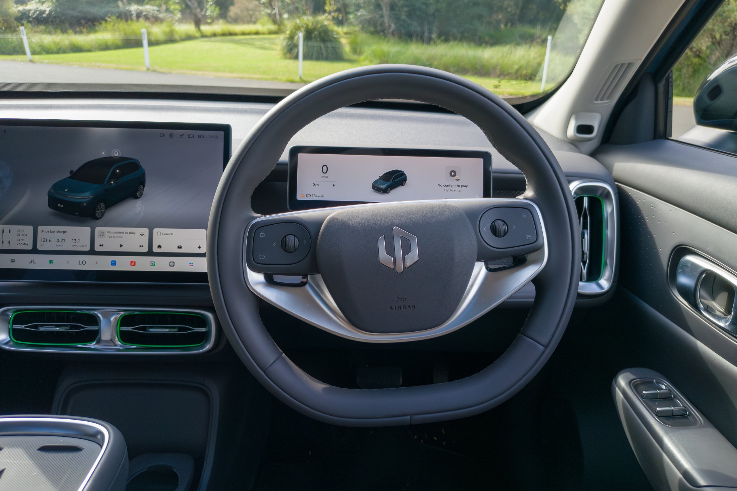 Close-up of the 2026 Leapmotor B10 flat-bottom steering wheel with Leapmotor badge and digital cluster