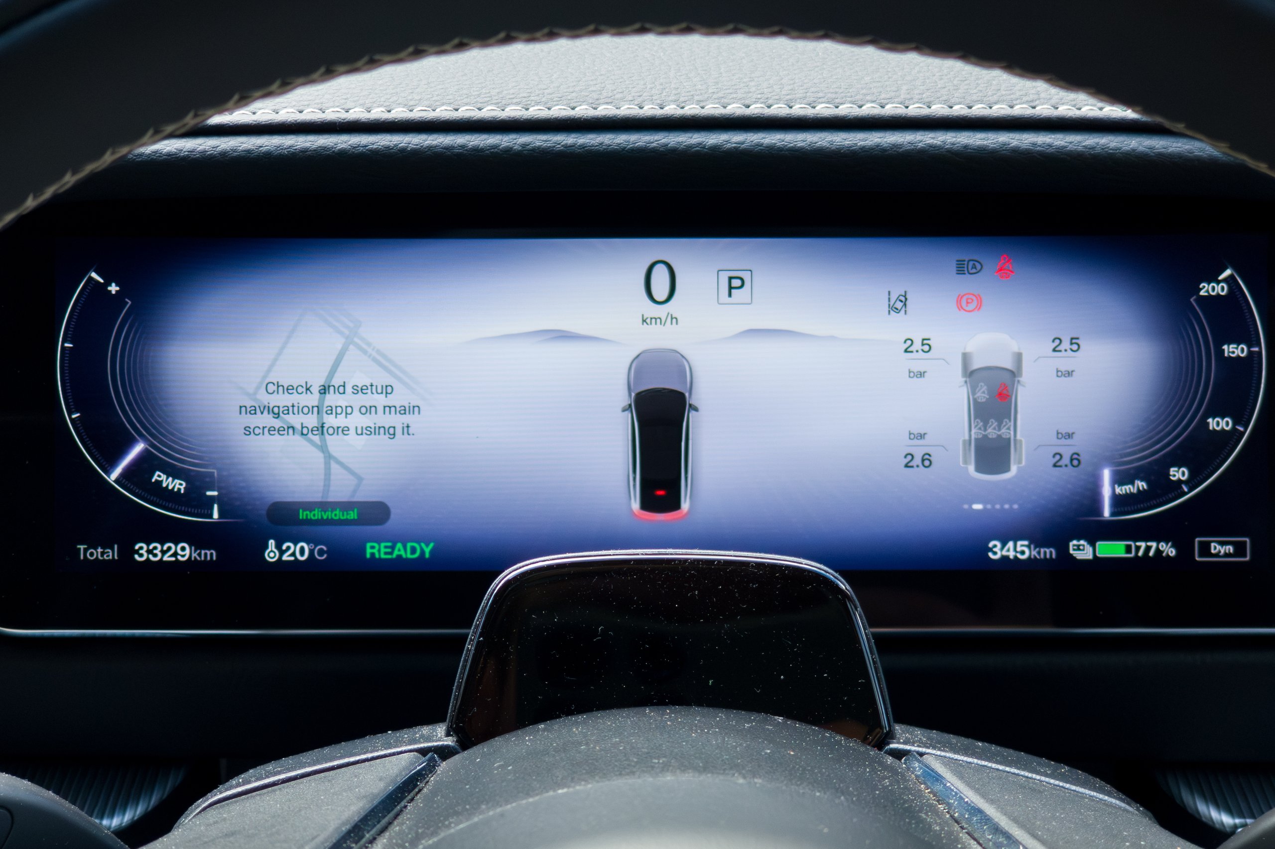 Digital instrument cluster of the 2026 Mazda 6e GT showing range, battery and tyre pressures