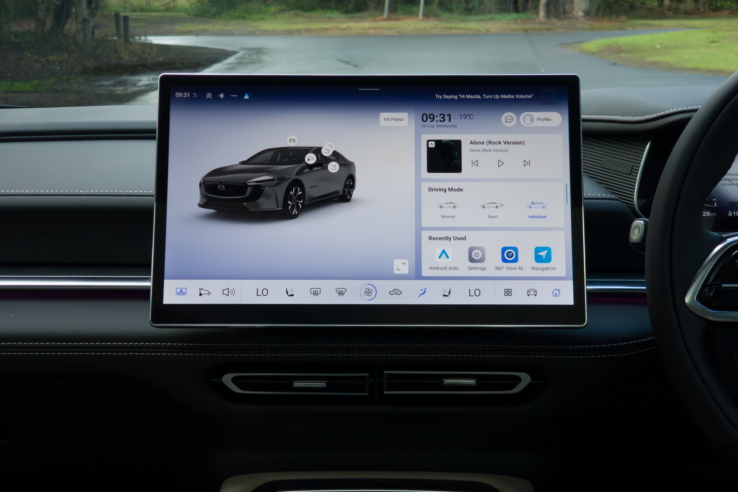 Central touchscreen of the 2026 Mazda 6e GT showing the home screen and drive modes