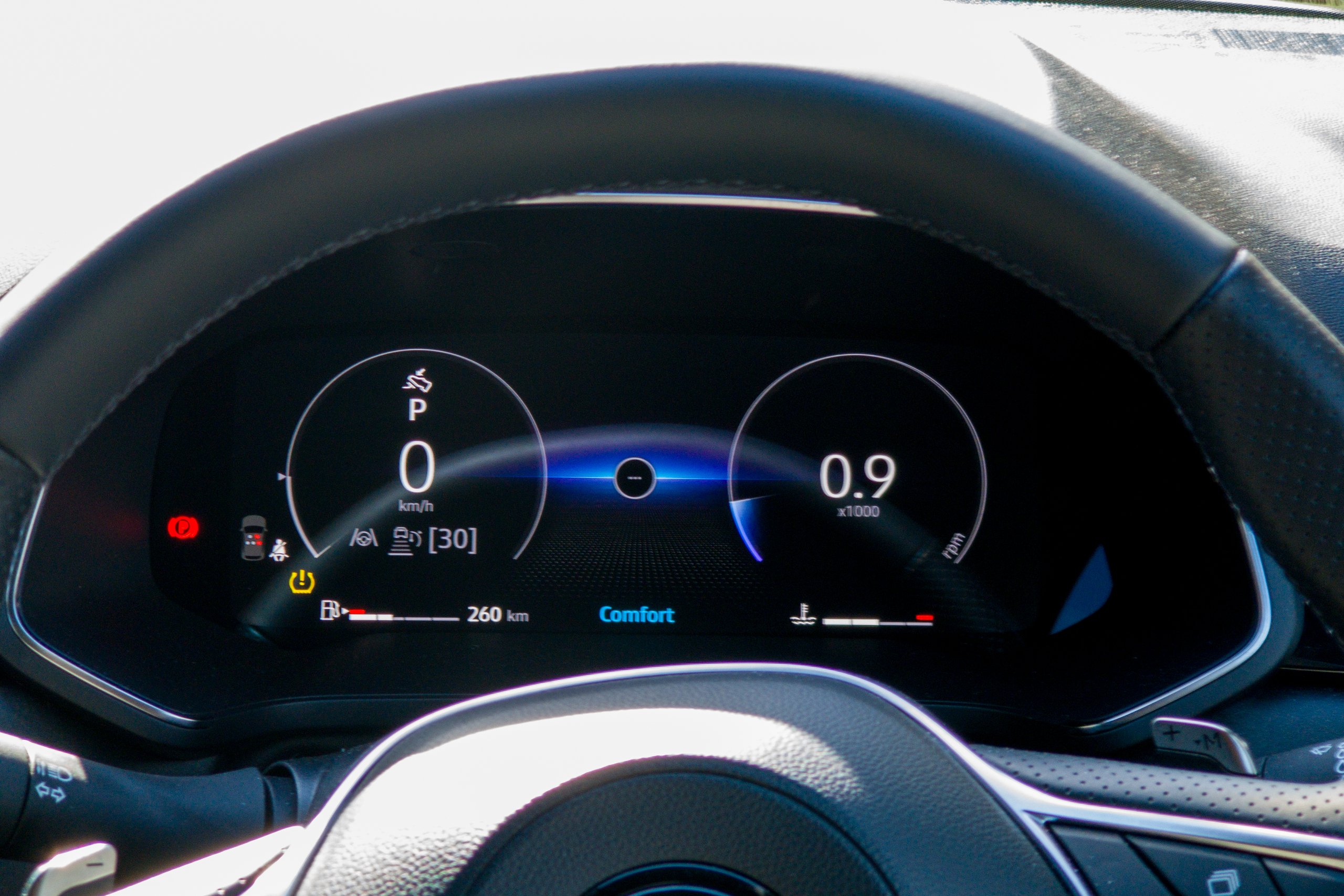 Driver's view of the 2026 Mitsubishi ASX Aspire instrument cluster through the steering wheel