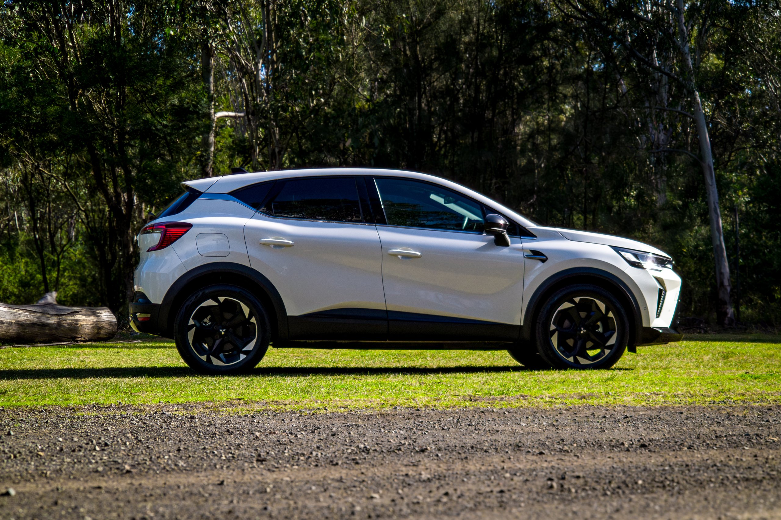 Crystal White 2026 Mitsubishi ASX Aspire driver's side profile with a gravel foreground