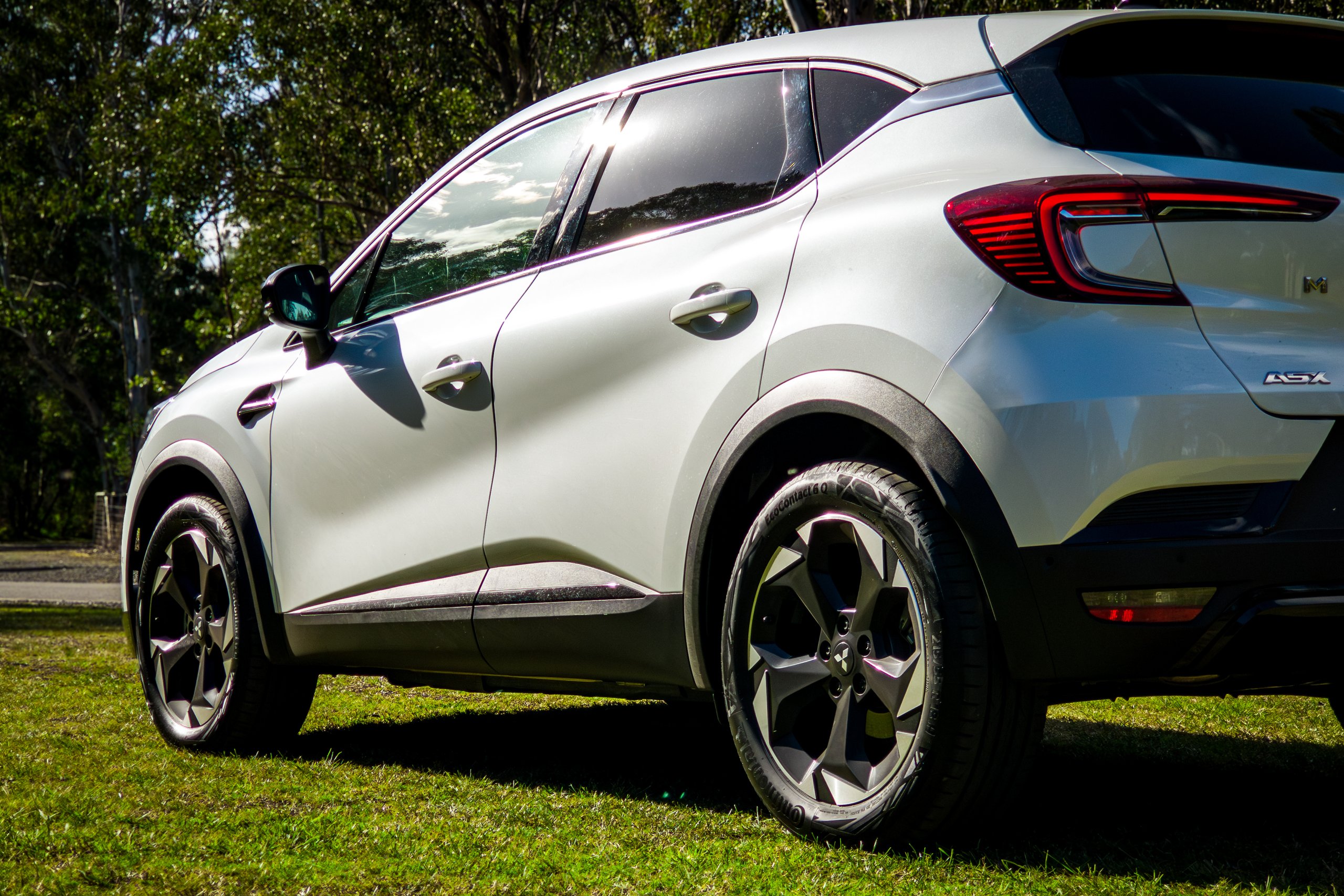 Close view of the 2026 Mitsubishi ASX Aspire rear flank, alloy wheels and ASX tailgate badge